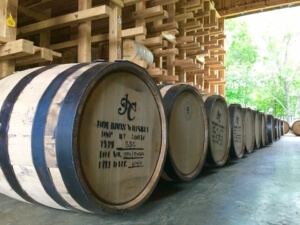 Whiskey barrels in a row.