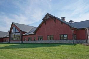 The building in the image is the Jeptha Creed Distillery located in Shelbyville, Kentucky.