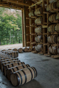 bourbon barrels in barn