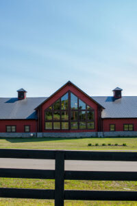 Red barn-style distillery. - jepthacreed