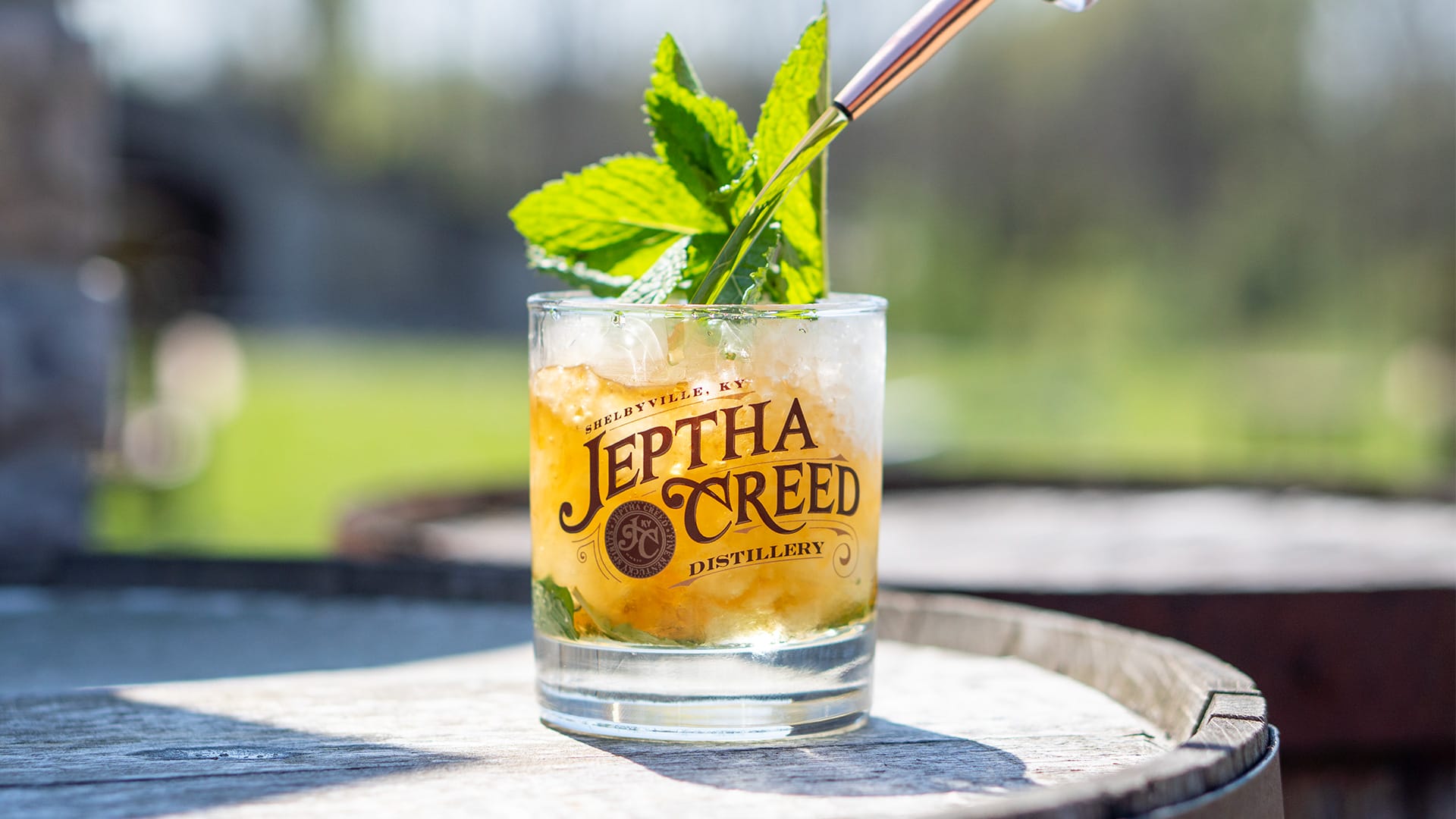 Jeptha Creed Kentucky Derby Mixology Class Cocktail being Created Outdoor on a Barrel